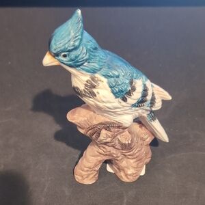 Blue and White Ceramic Bird Figurine on Perch
